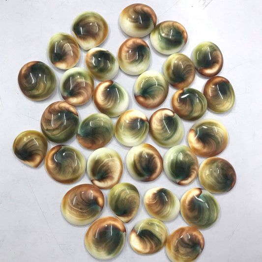 Shiva eye shell cabochons pile – natural turban snail operculum spiral eye pattern mixed sizes