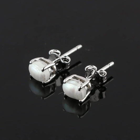 Natural White Pearl Oval Stud Earrings 925โฏSterling Silver | Elegant Gemstone Jewelry Armonia Gems