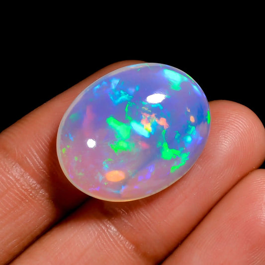 Genuine 14.00 Ct white welo Ethiopian opal gemstone showcasing radiant play of colors.