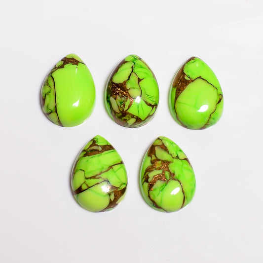 Loose Mohave Turquoise gemstone in light green, cut and polished for jewelry makers sourcing distinctive cabochon material