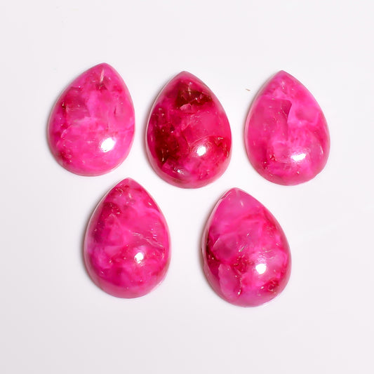 Pink Turquoise cabochon representing an uncommon shade within the December birthstone family, sought after for its distinct rosy color