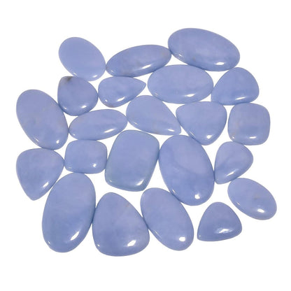 100ct natural angelite cabochon wholesale lot mixed shapes lavender blue – full lot view Peru origin