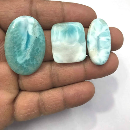 Blue larimar cabochon showing natural sky blue and white pattern
