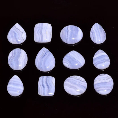 Natural blue lace agate gemstone cabochons mixed shapes on white background – individual pieces