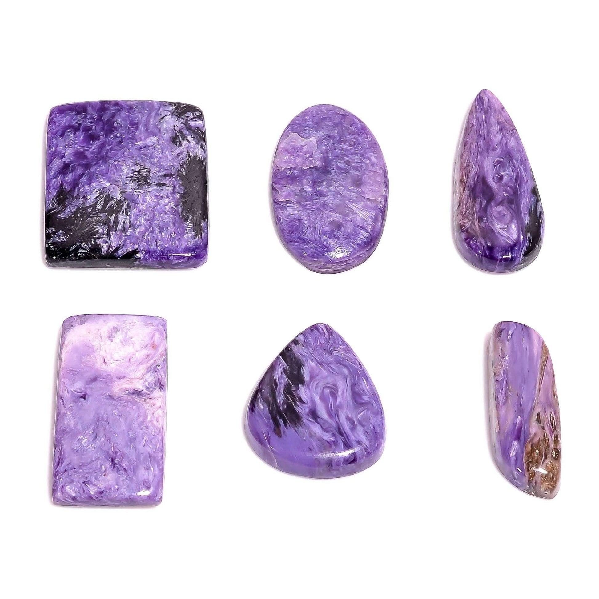 Natural purple charoite showing lavender white and black aegirine swirls
