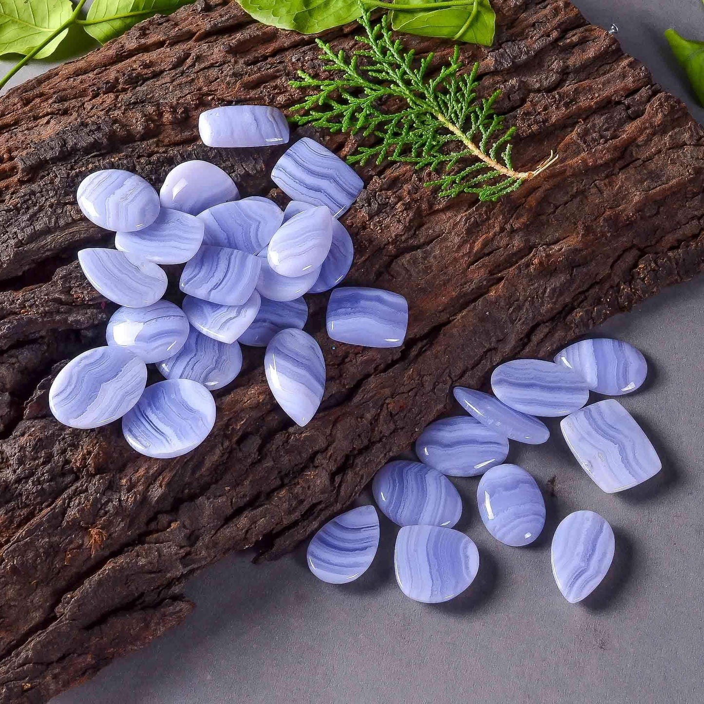 Wholesale blue lace agate stones 20–35mm – close up soft blue white lace banding pattern