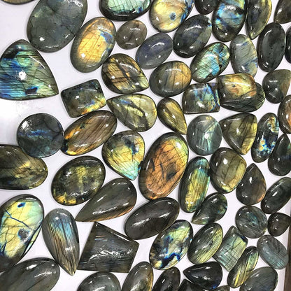 Labradorite spectrolite wholesale lot mixed shapes bulk view – strong iridescent color flash