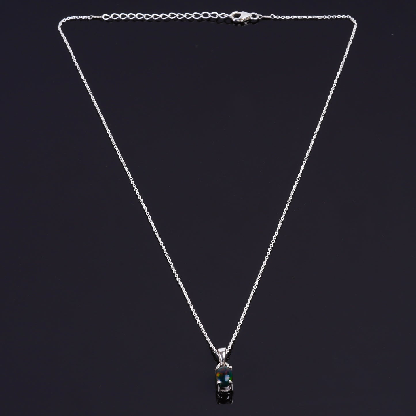 Rare jewelry design in a 13 Ct Black Ethiopian Opal Pendant