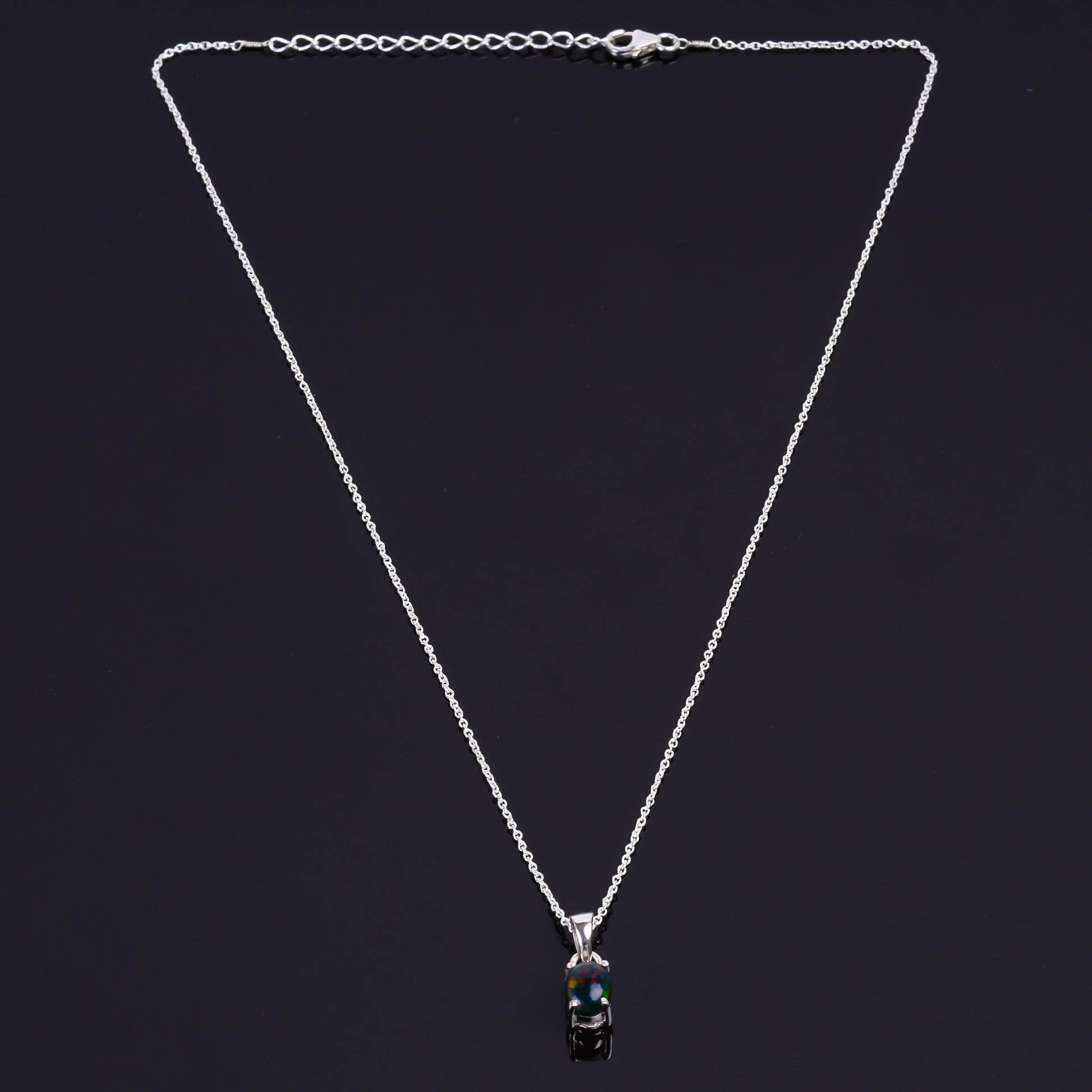 Rare jewelry design in a 13 Ct Black Ethiopian Opal Pendant