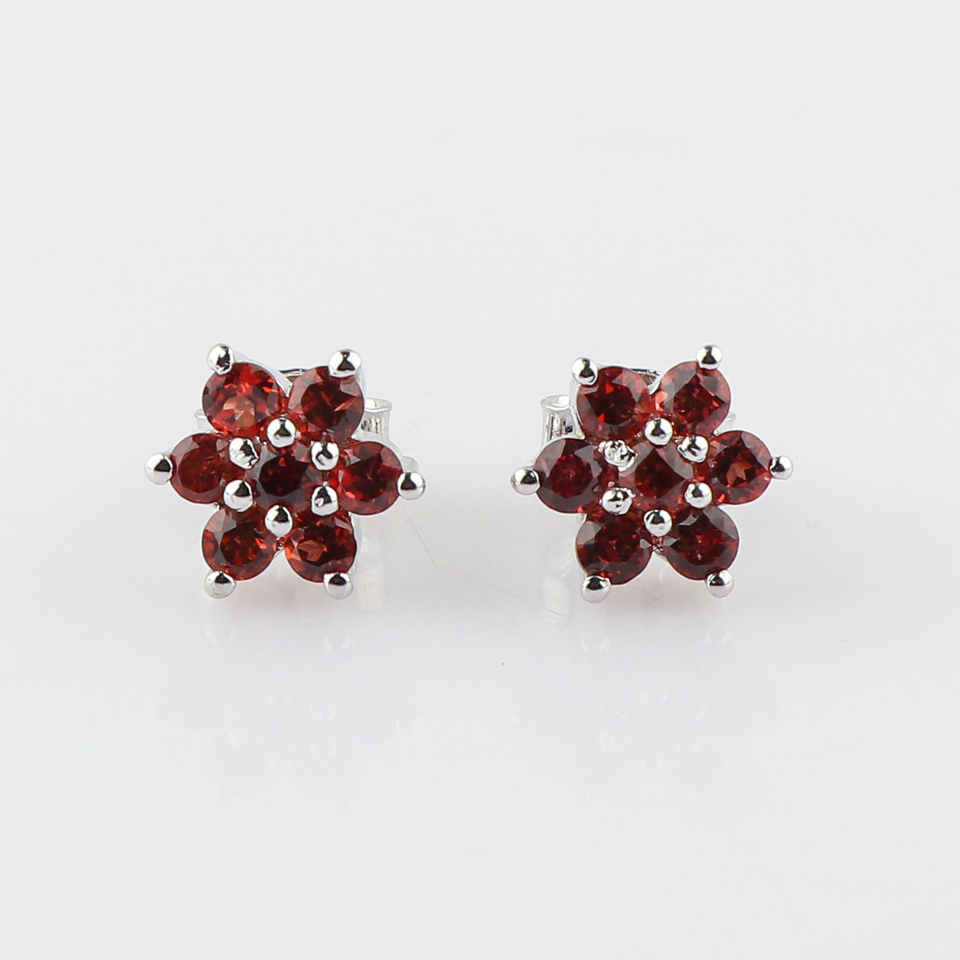 Delicate 7-Stone Garnet Flower Stud Earrings