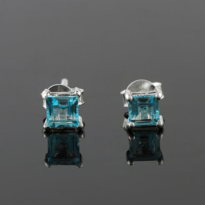 925 Sterling Silver Crafted Stud Earrings, each made with a 4x4 mm Sky Blue Topaz
