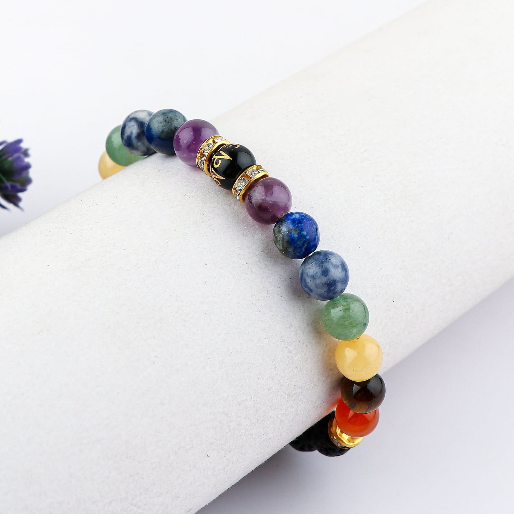 Multicolored beaded bracelet on a white surface