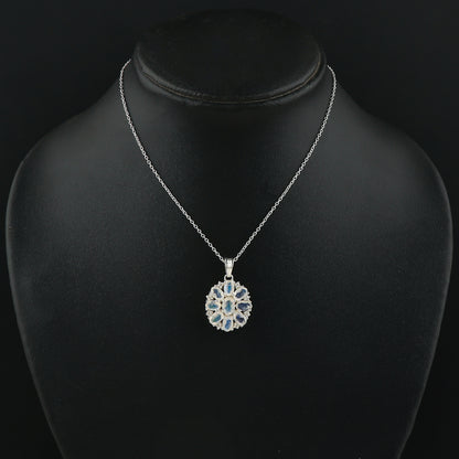 Silver necklace with a pendant on a black mannequin bust