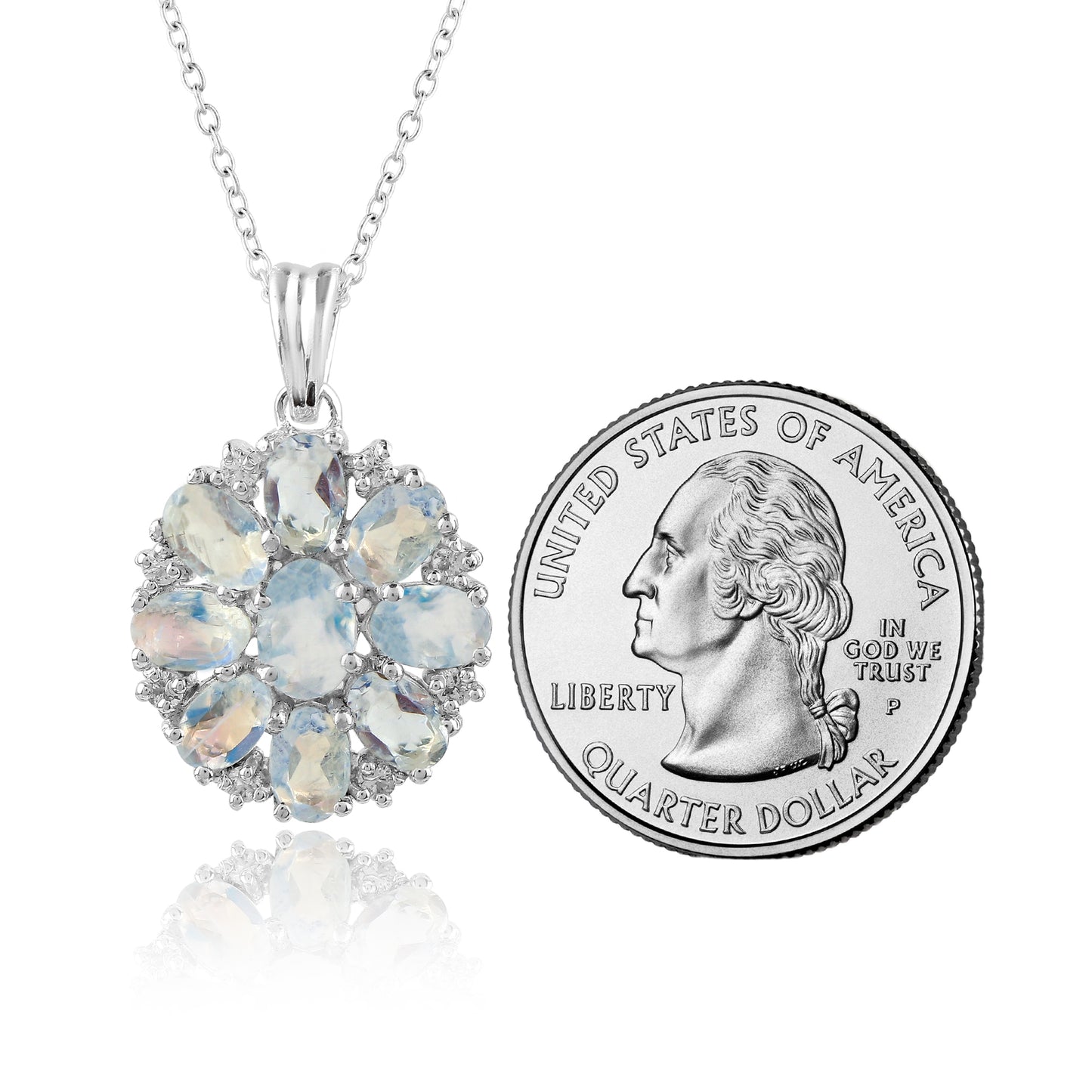 Opal pendant necklace next to a U.S. quarter dollar coin on a white background