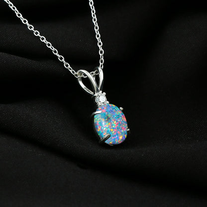 Opal pendant necklace with a black background