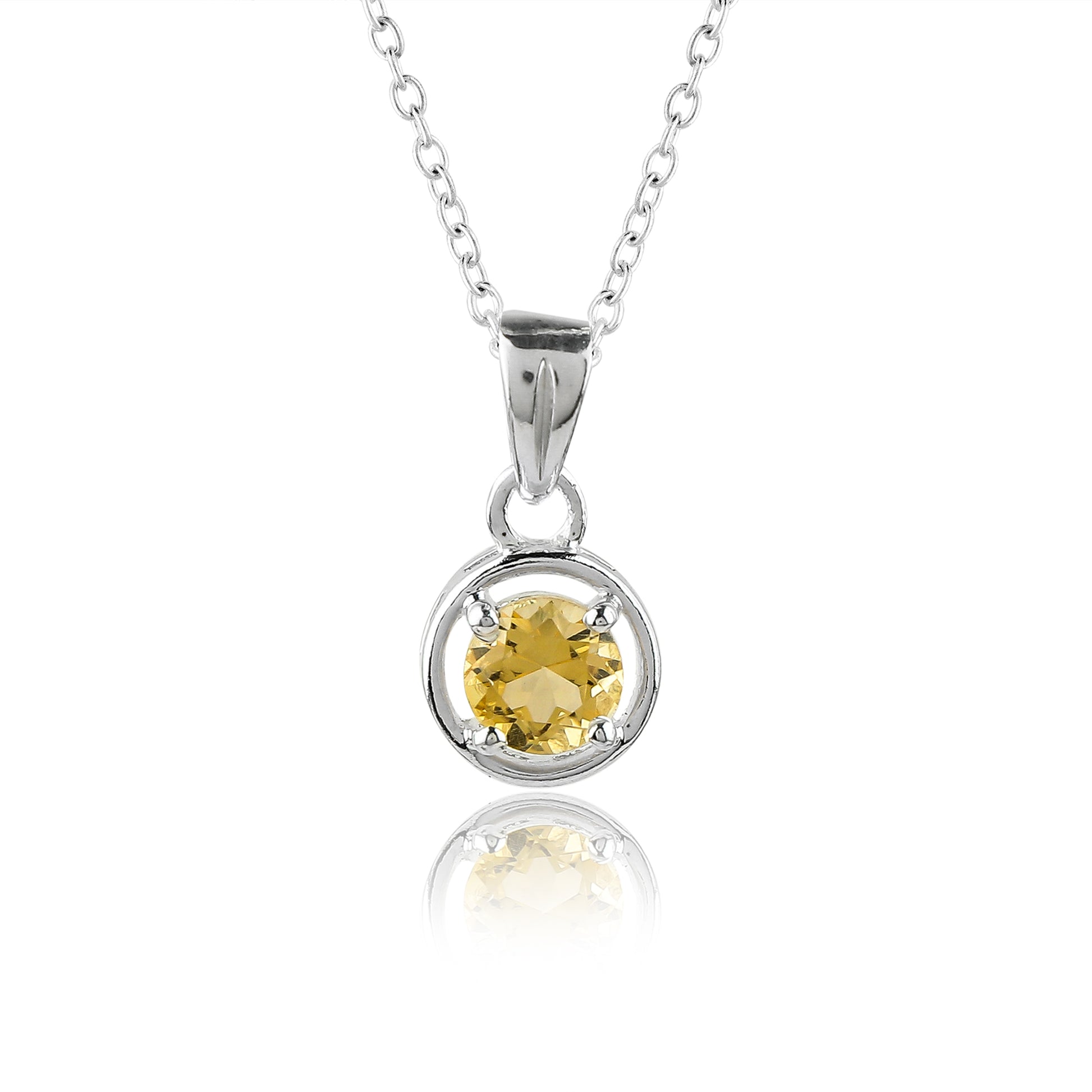 Silver pendant with a yellow gemstone on a white background