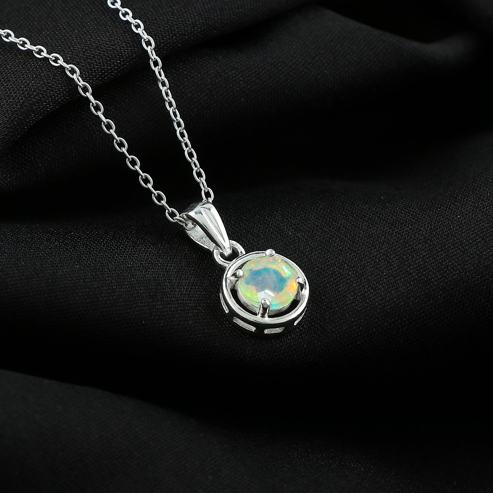 Elegant Pendant handcrafted in 925 silver with 0.5 Ct Ethiopian Opal Stones