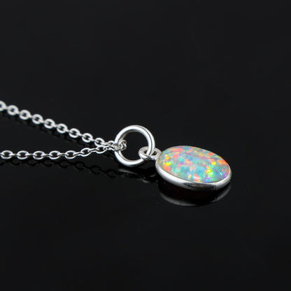 Elevating Gemstones in a 1.3 Ct Ethiopian Opal Pendant