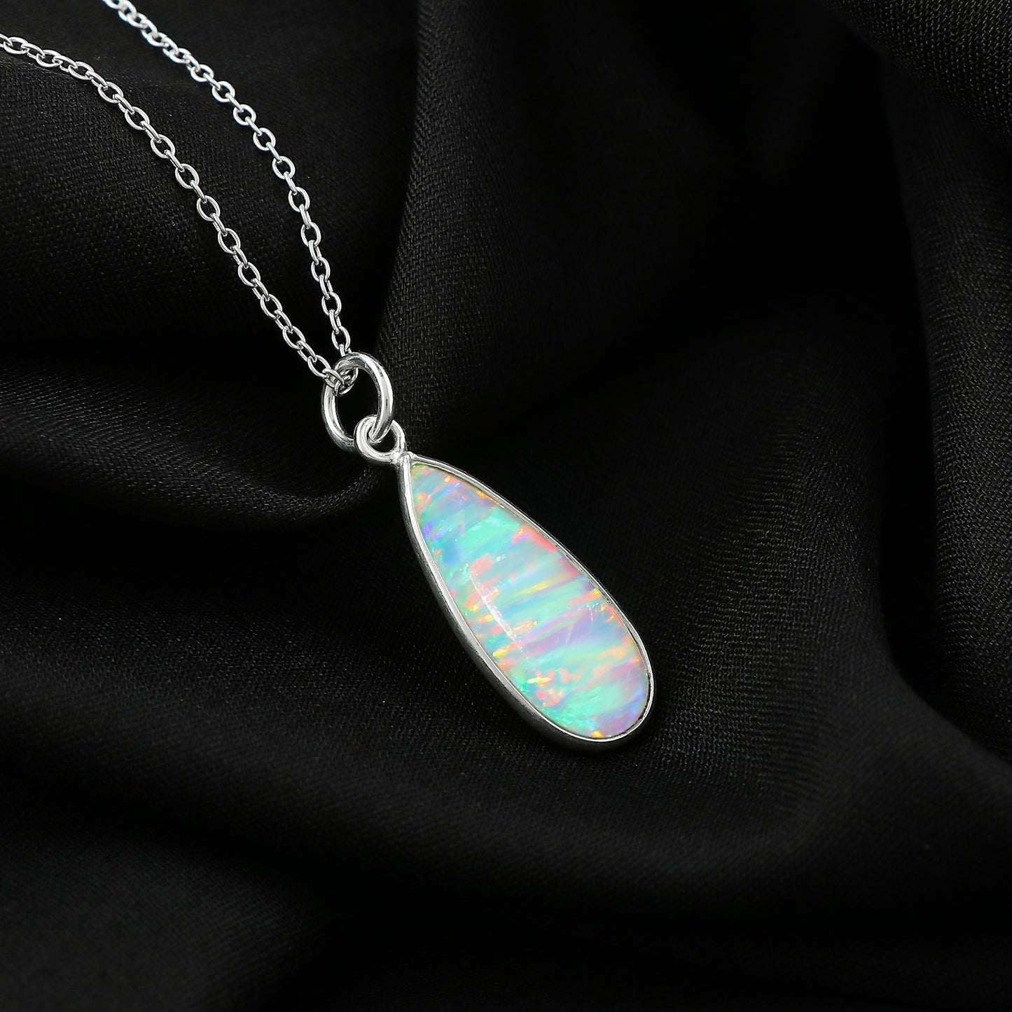 Elegant designs in 1.3 Ct White Line Ethiopian Opal Pendant mounted on 925 silver