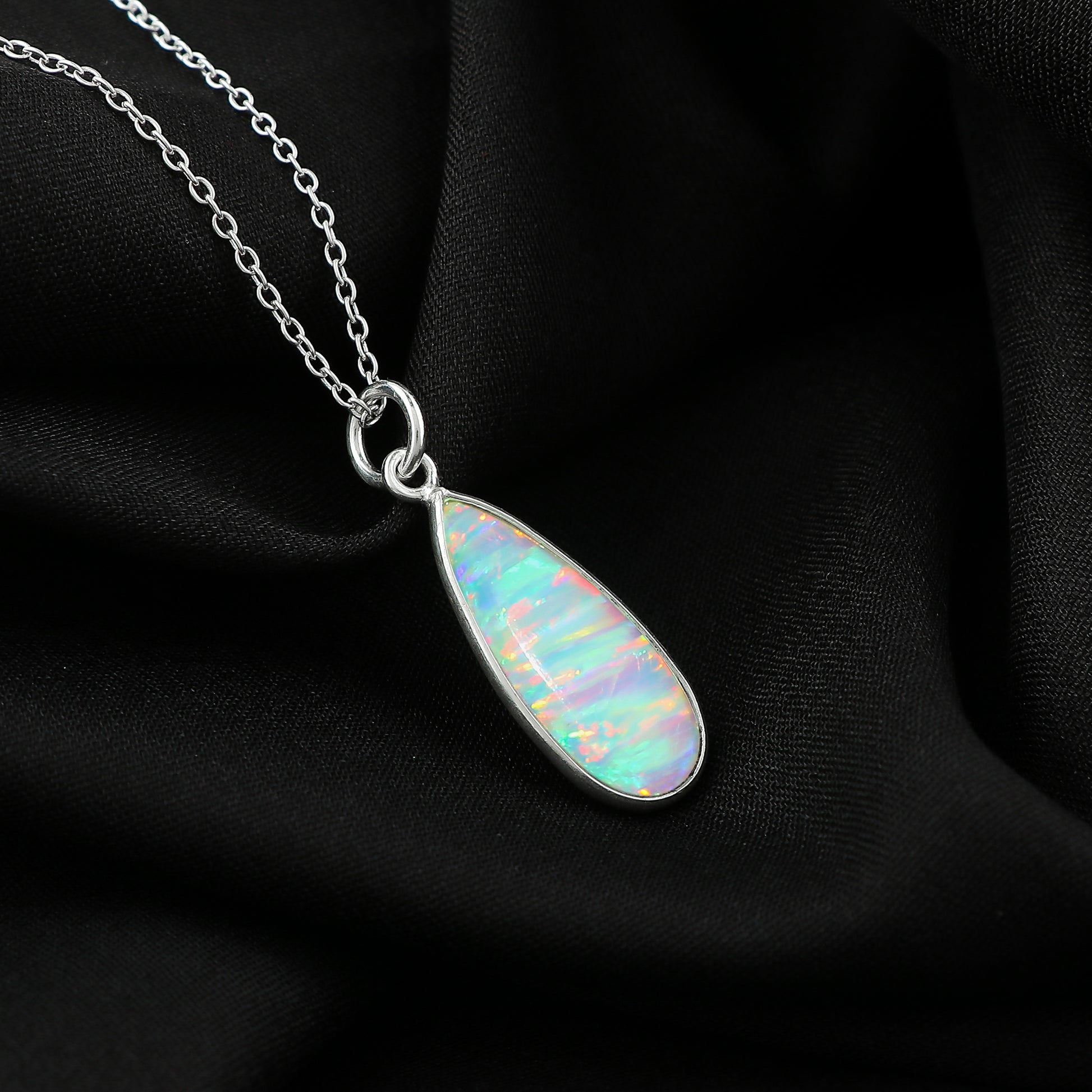 Elegant designs in 1.3 Ct White Line Ethiopian Opal Pendant mounted on 925 silver