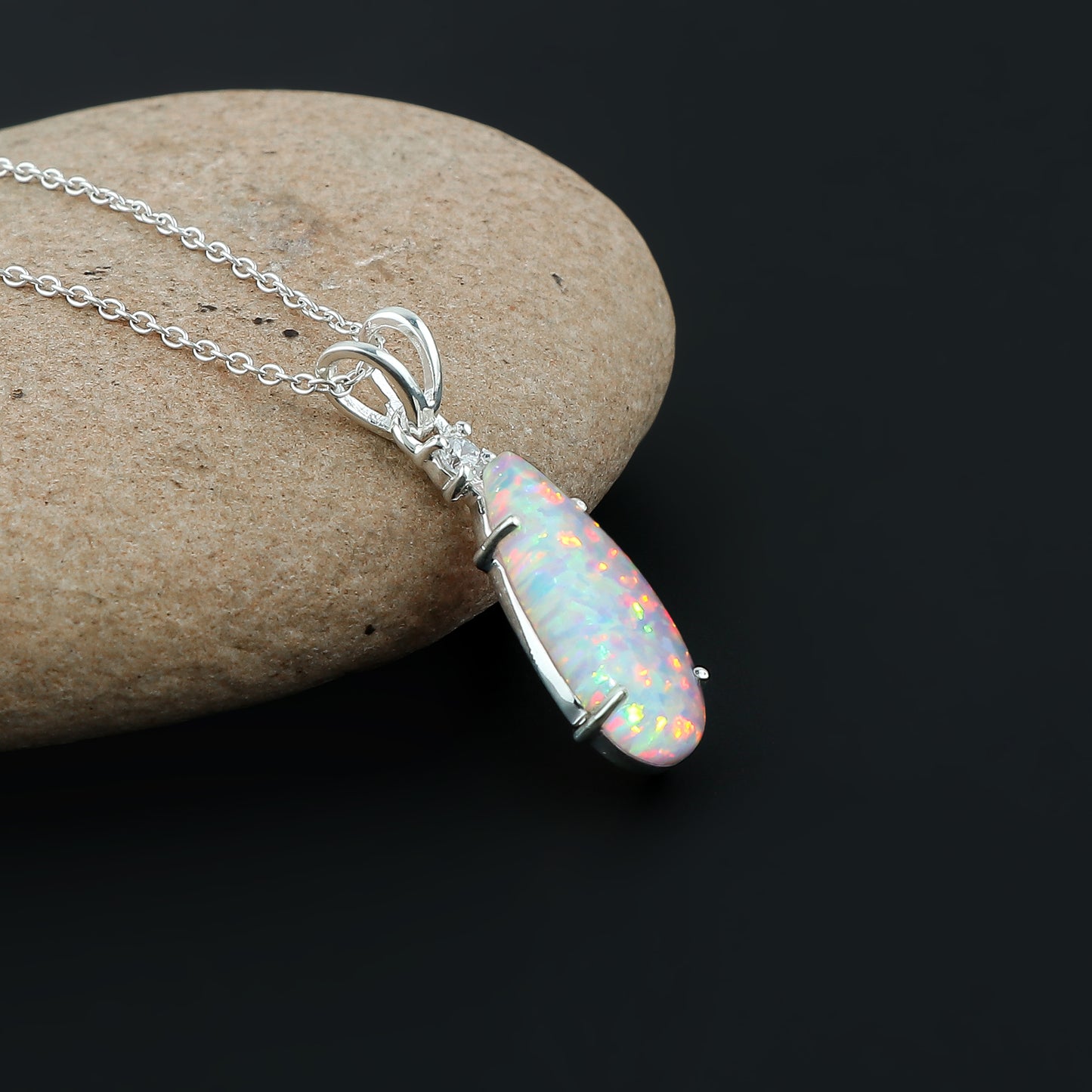 Radiant play of color in 2.5 Ct White Dot Ethiopian Opal Pendant, Natural and ethically sourced Opal