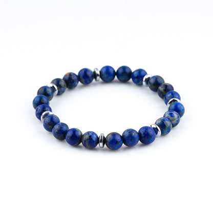 Lapis Lazuli Blue beaded bracelet with silver accents on a white background