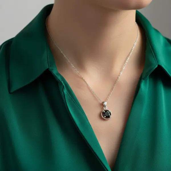 Round faceted Black Spinel Pendant Necklace styled in Sterling Silver