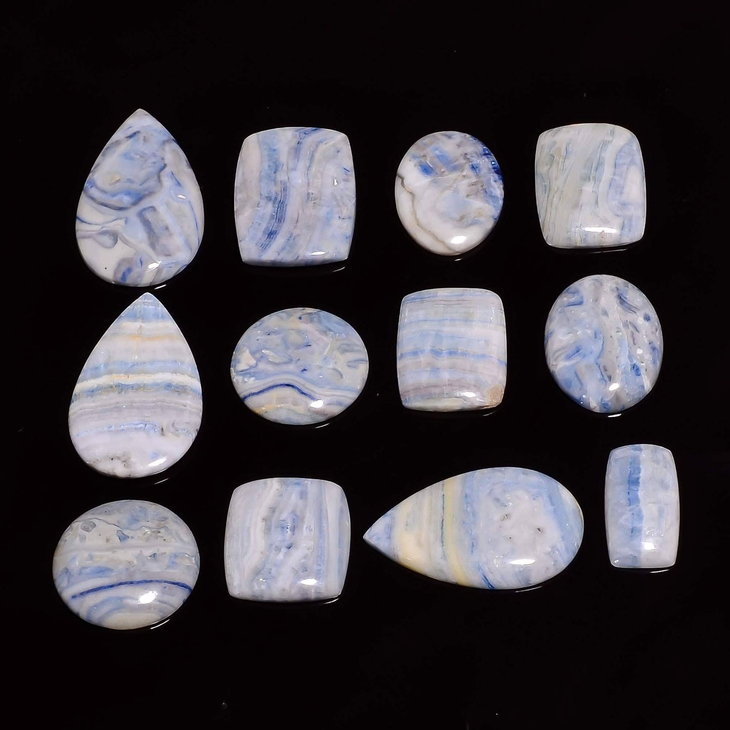 Buy polished blue scheelite gemstone cabochons bulk
