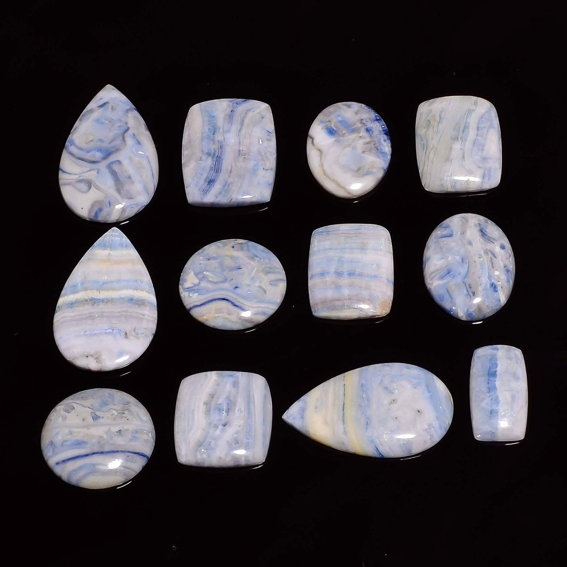 Buy polished blue scheelite gemstone cabochons bulk
