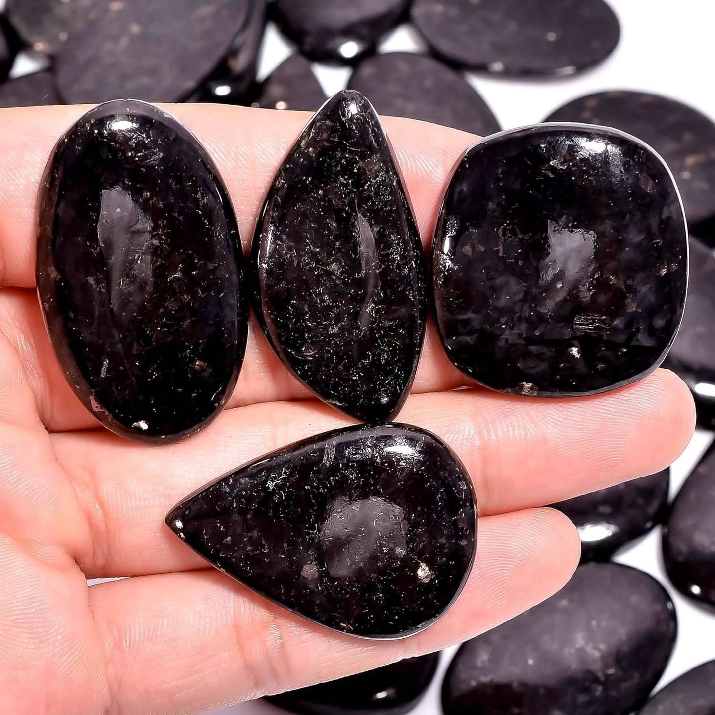 vGenuine nuummite vs coppernite comparison stone lot