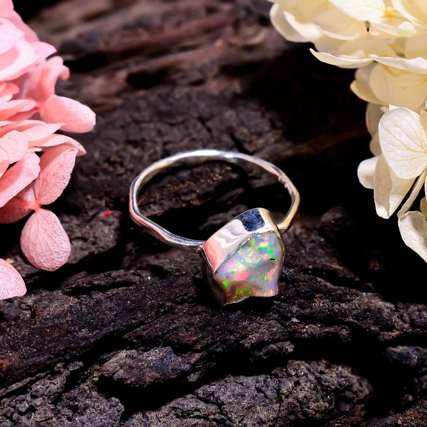 Stunning handmade Ethiopian opal gemstone ring with vibrant natural play-of-color