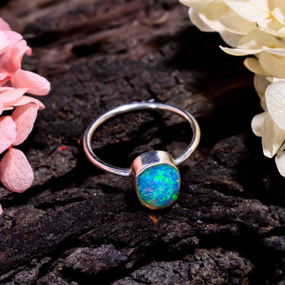 Dazzling natural opal gemstone showcased in a handcrafted sterling silver ring