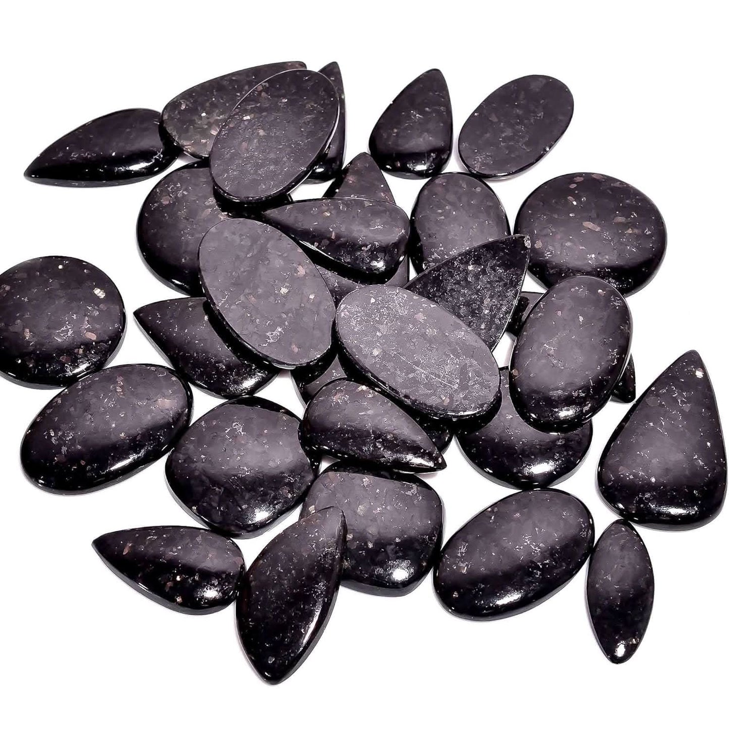 Natural golden nuummite gemstone with iridescent flashes
