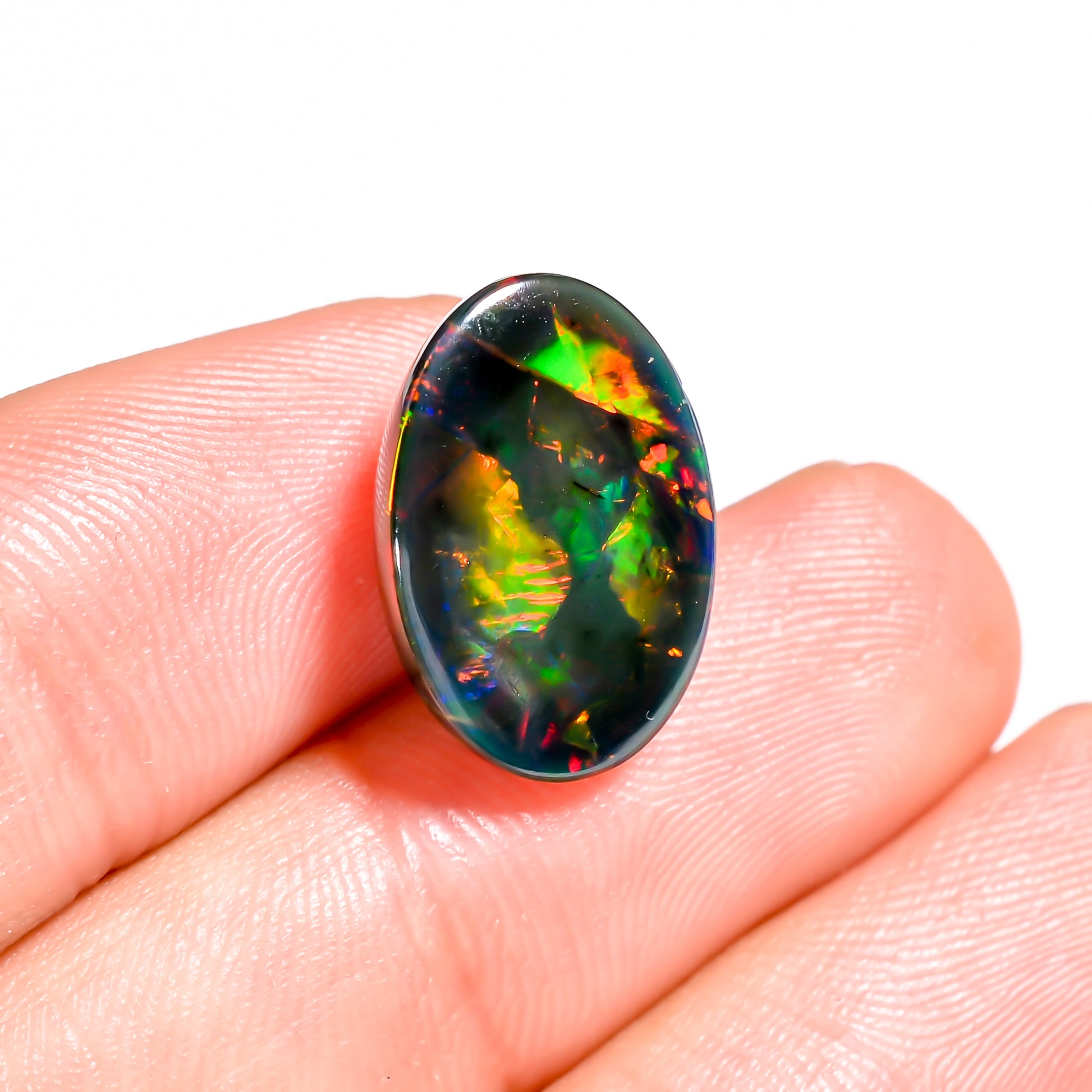 Handicrafted with perfection, the stunning 6.5 Ct Black Ethiopian Opal Cabochon, Natural and Authentic Gem