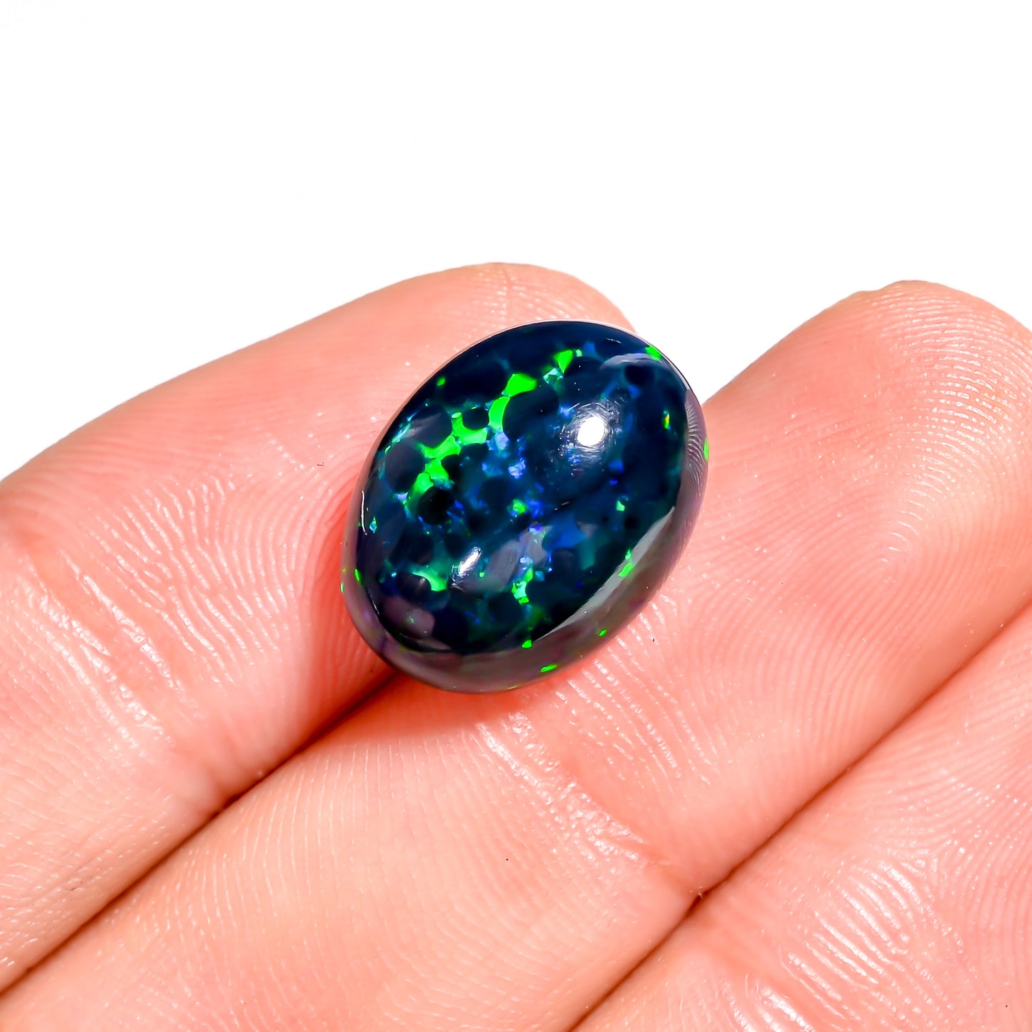 Stunning Play of fire in 5.5 Ct Black Ethiopian Opal Cabochon