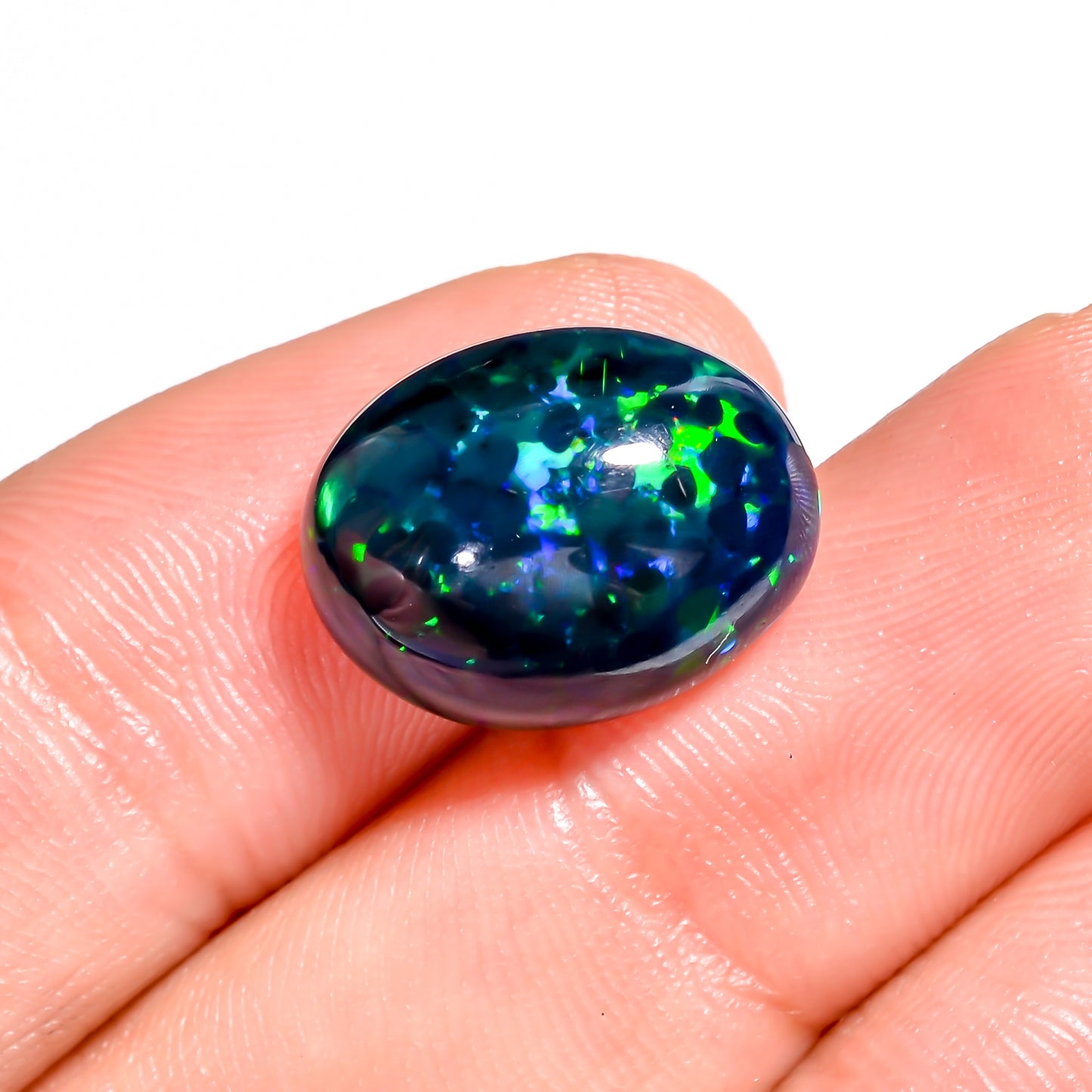 Unique spectral play of color in 5.5 Ct Black Ethiopian Opal Cabochon