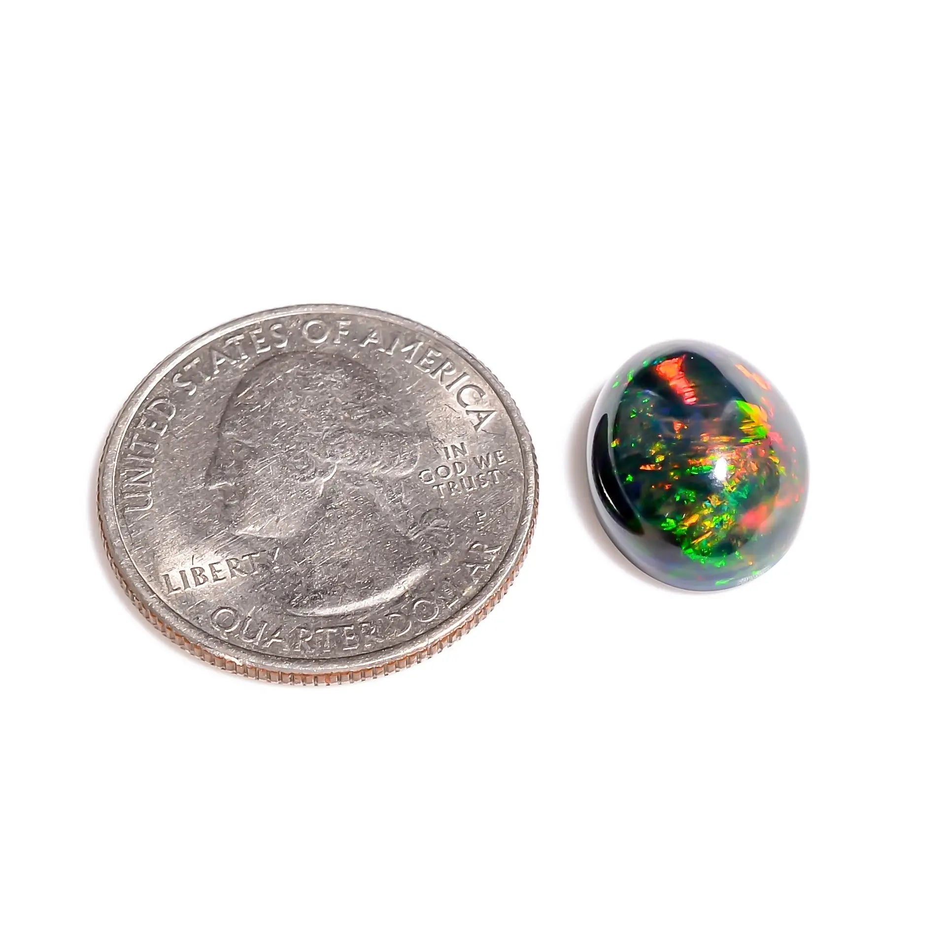 Stunning play-of-color in oval Black Ethiopian Opal for luxury jewelry 
