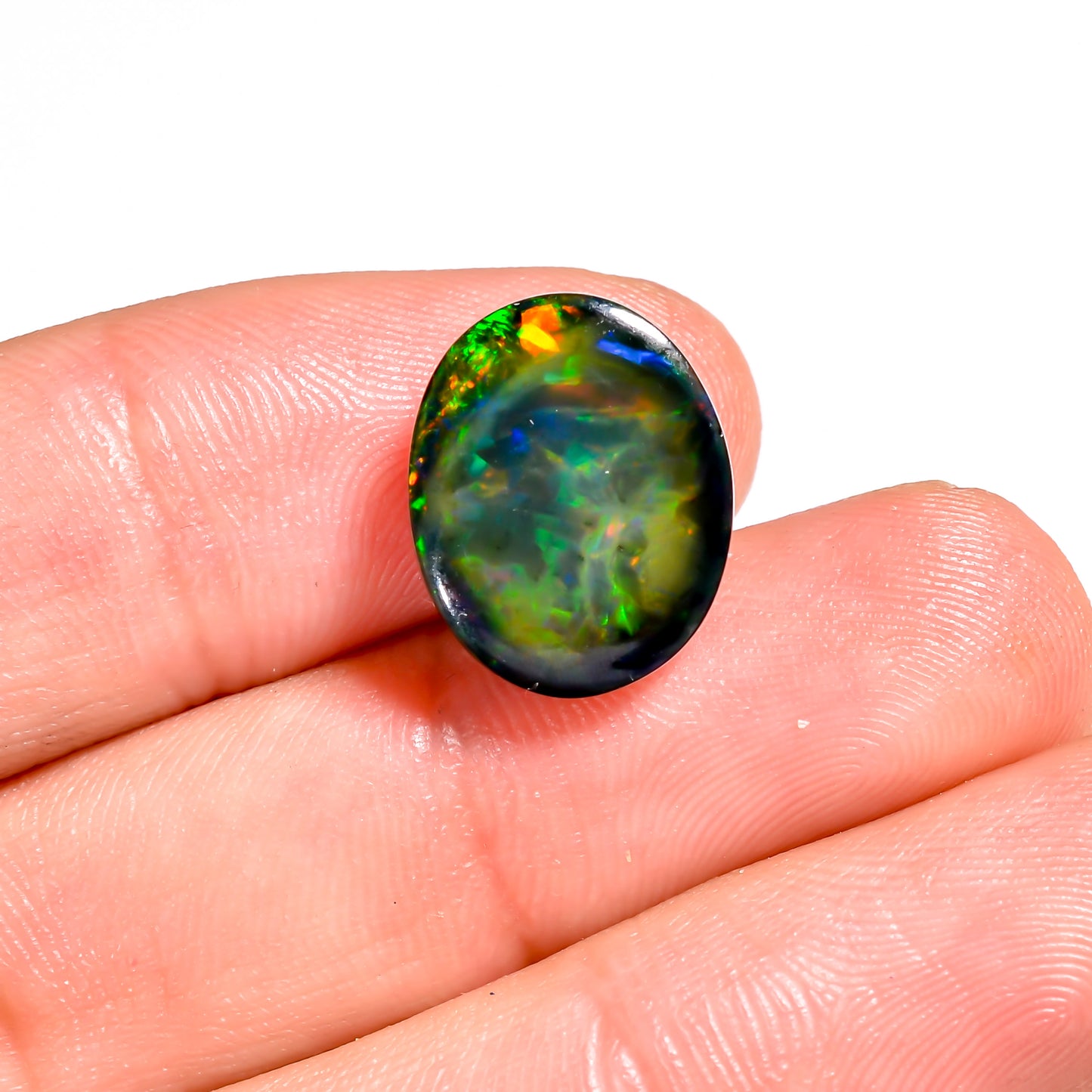 Beautiful small size 6.50 carat black Ethiopian opal gemstone 
