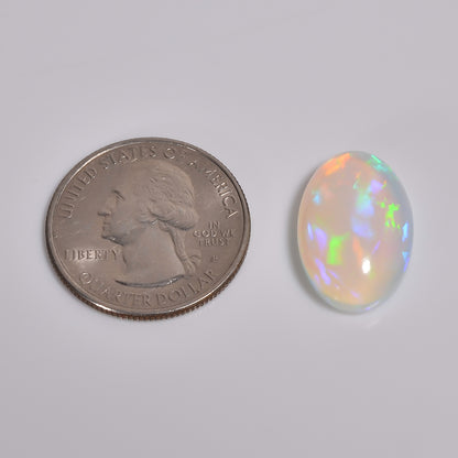 Natural loose 9.50 carat white Ethiopian opal cabochon with vibrant sparkle 
