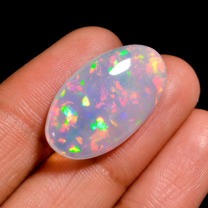 Loose 10 Ct White Ethiopian Opal stone showing vibrant fire.
