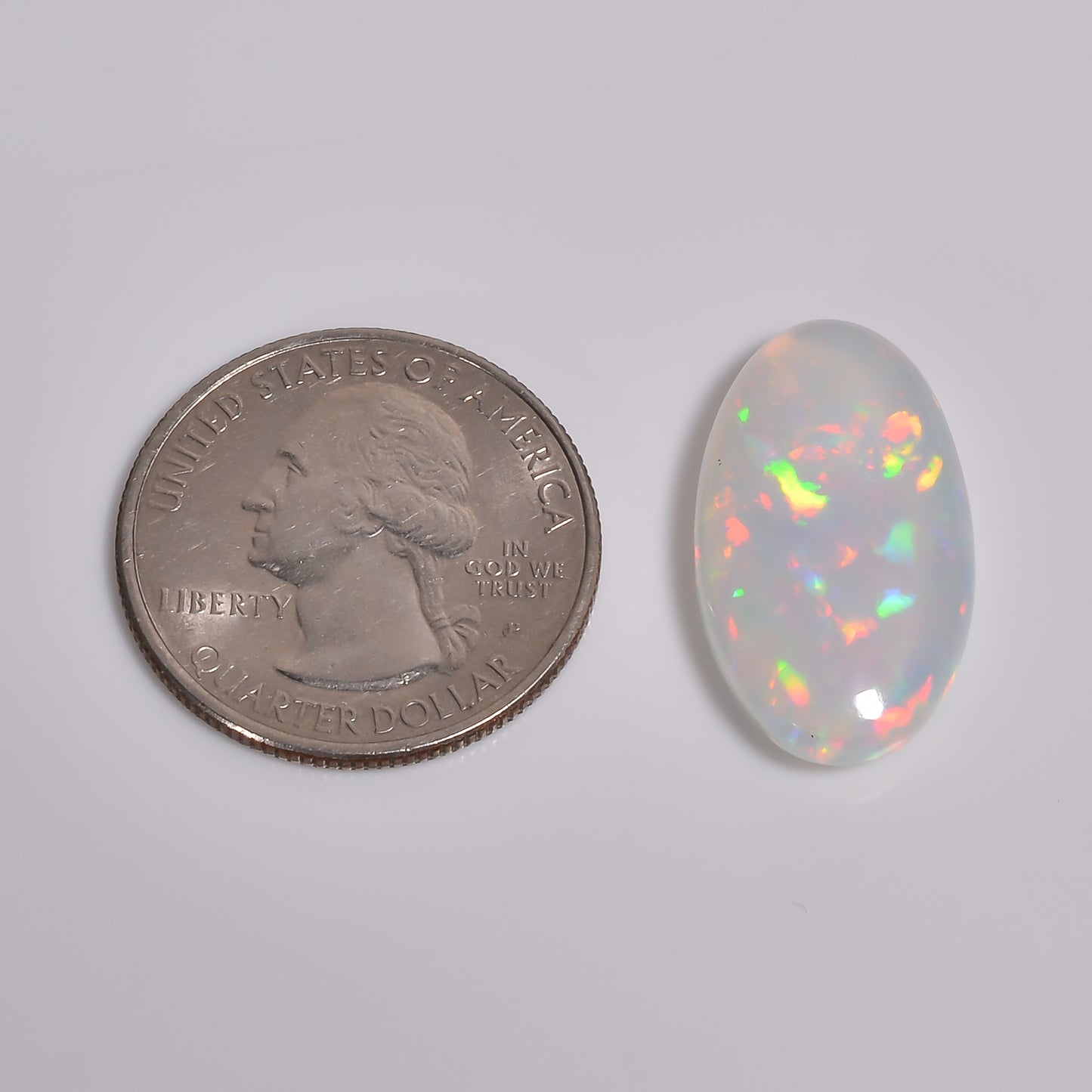 10.00 carat white Ethiopian opal gemstone with vivid play-of-color, AAA quality
