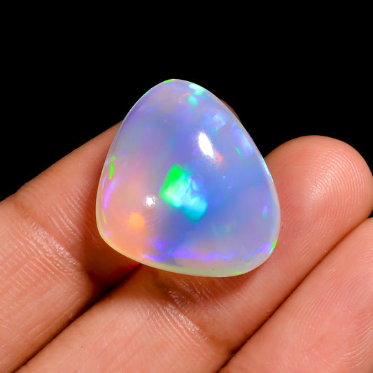 Natural White Ethiopian Opal gem in a heart-shaped, loose stone with fiery sparkle
