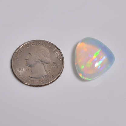 Heart-shaped 16.50 carat White Ethiopian opal gemstone with multi-flashy color
