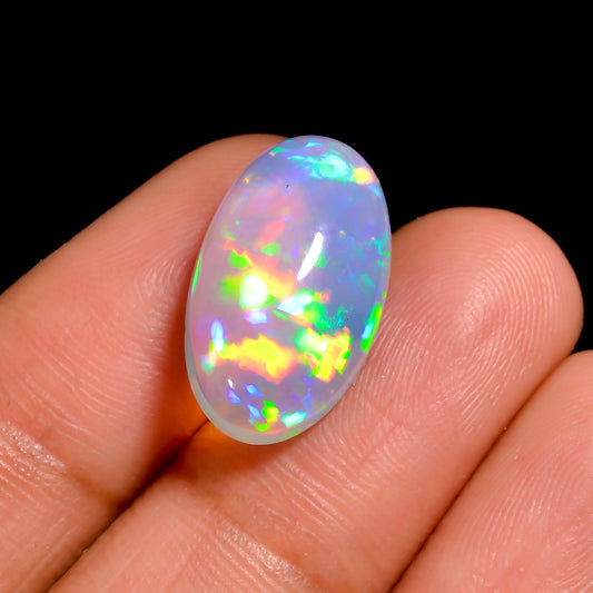 Premium 5.50 carat White Ethiopian Opal Cabochon with fire play colours 
