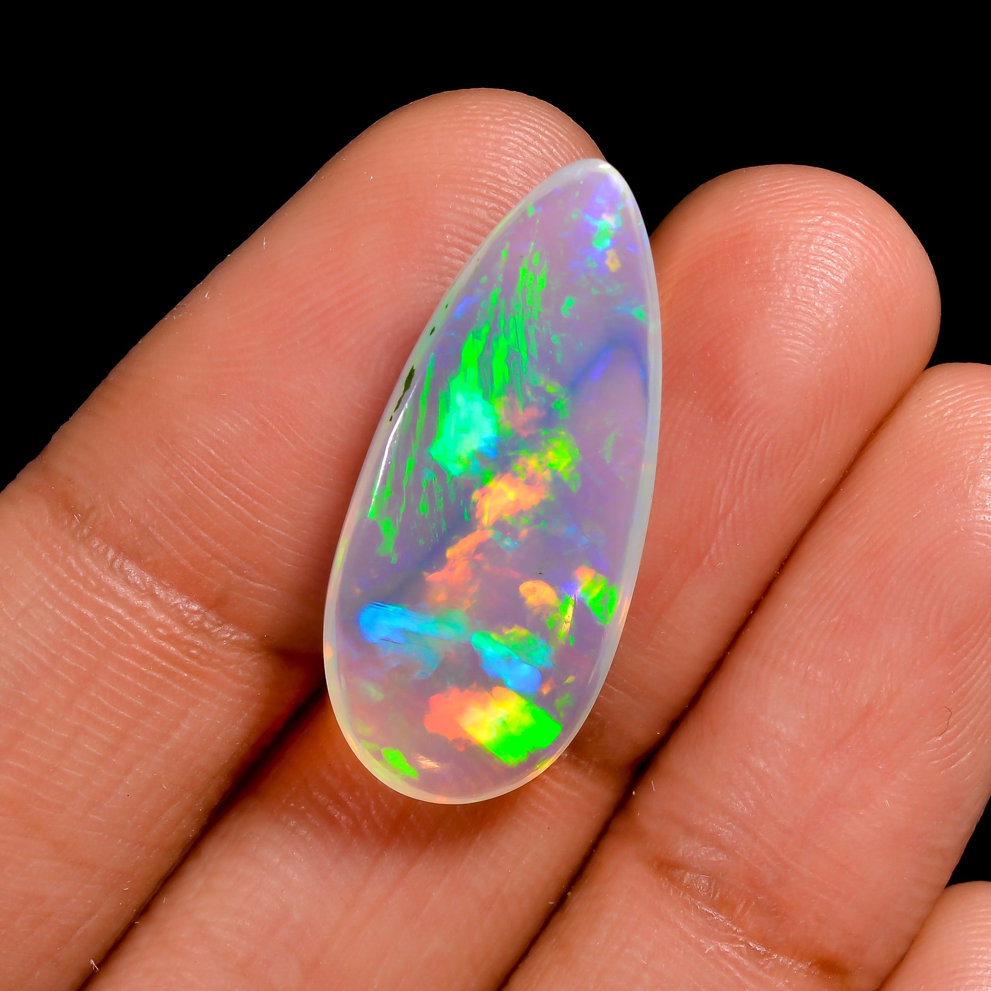 Loose 7.00 carat White Ethiopian Opal Flashy Pear Stone for all designs 
