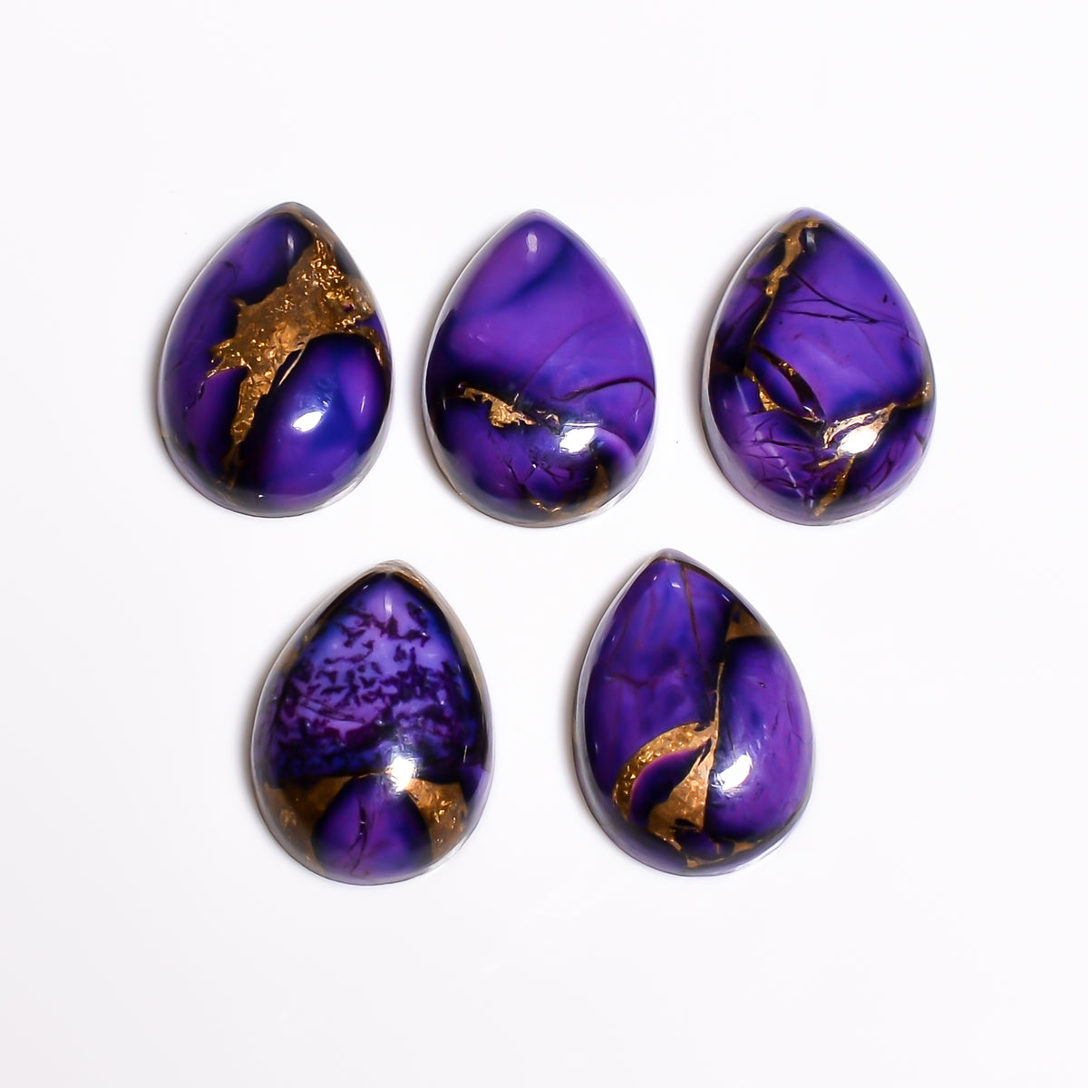 Dark Blue Copper Turquoise cabochon in pear shape, showing a deep, saturated blue tone with fine natural copper matrix running through it