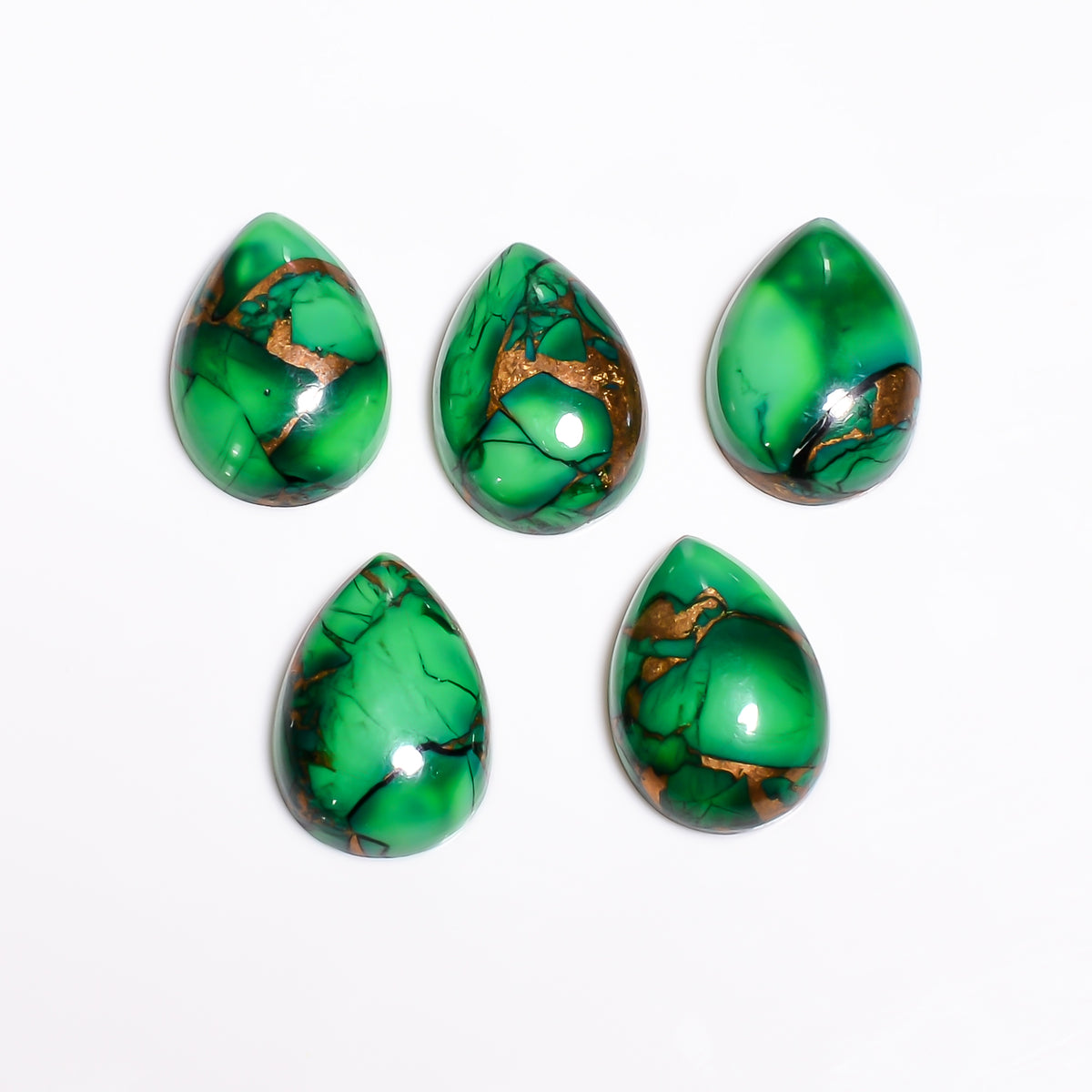 Wholesale lot of Dark Green Turquoise loose gemstones, sourced for jewelry makers who want a richer, bolder green shade