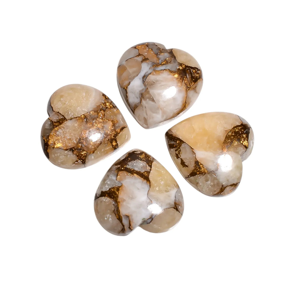 Four gold copper turquoise heart cabochons with cream and white stone on a white background