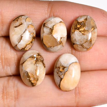 Gold Turquoise oval cabochon shown against a carat weight and size reference chart, helping buyers gauge proportions before purchase