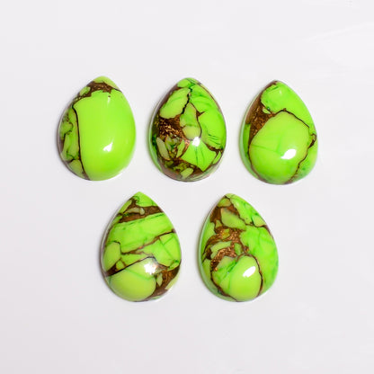 Loose Mohave Turquoise gemstone in light green, cut and polished for jewelry makers sourcing distinctive cabochon material